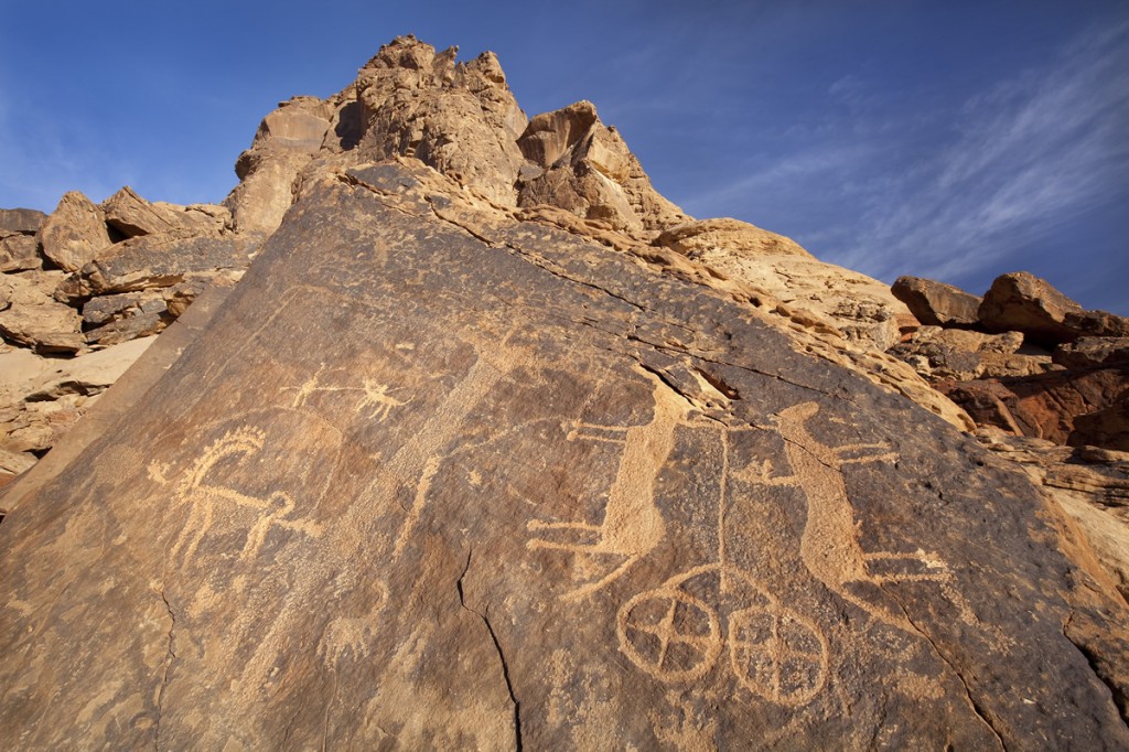 The petroglyph of a chariot pulled by two horses at Jubbah that Euting illustrated. Note that Euting did not indicate the damage to the head of the horse on the left or the rider added to the horse on the right by a later artist.